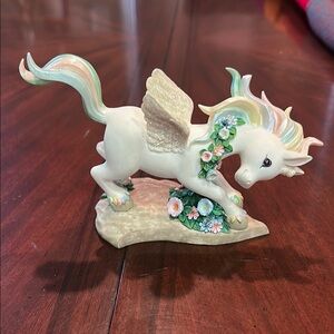 White Unicorn Figurine with Floral Accents